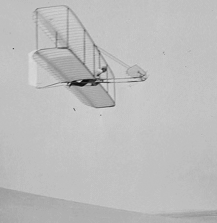 Wilbur Wright flying in his glider